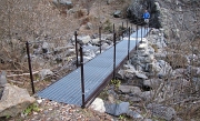 56 Attraverso il torrente su un nuovissimo ponticello...